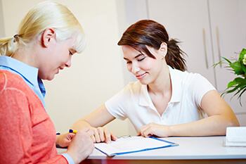 Patient Filling out Eye Care Forms