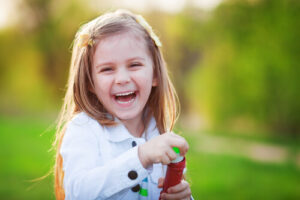 Young girl playing after an eye exam